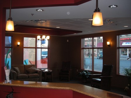 accent lighting front reception desk featuring Cambria