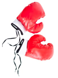 Red boxing gloves - isolated over a white background